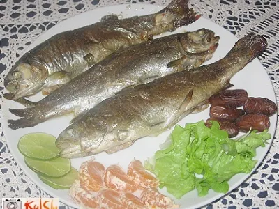 Postrvi z datlji in rižem