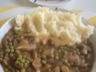 Šampinjoni v grahovi omaki