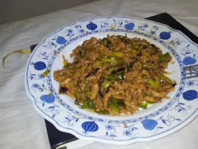 Klementinin piščanec v pečenem rižu s porom