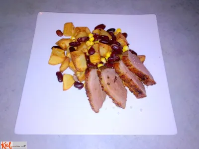 Pečen račji file s krompirjem, fižolom in koruzo