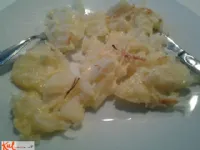 Fotografija recepta: Pečen krompir s sirom in čebulo