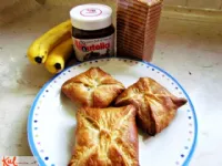 Fotografija recepta: Žepki z banano, Nutello in piškoti
