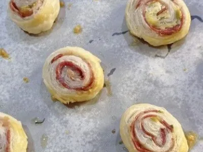 Polžki z rožmarinom in pršutom