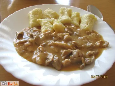 Svinjina z gorčico in šampinjoni